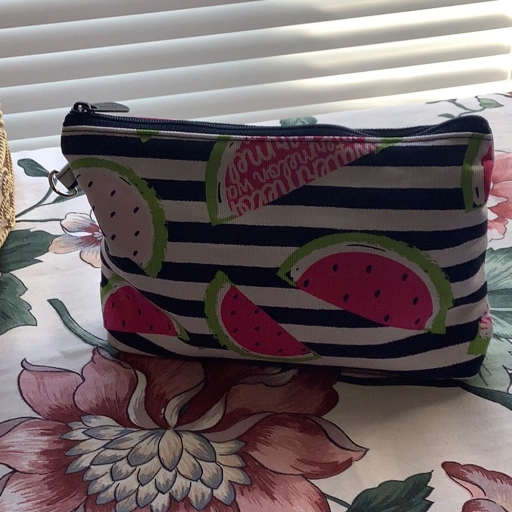 Cosmetic bag by ThirtyOne NWOT watermelon detail. Zipper compartment pin…